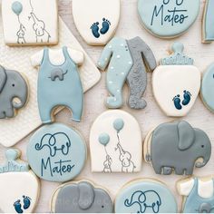 baby shower cookies decorated with blue and gray icing