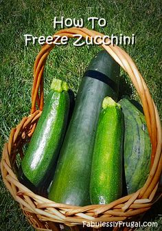 several cucumbers in a basket sitting on the grass with words freeze zucchini