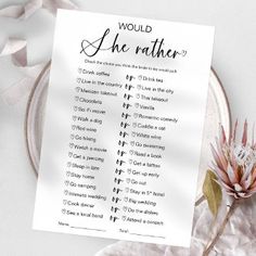 there is a paper with the words would i be father on it next to some flowers