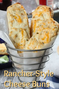 rancher - style cheese buns in a wire basket with text overlay that reads rancher - style cheese buns