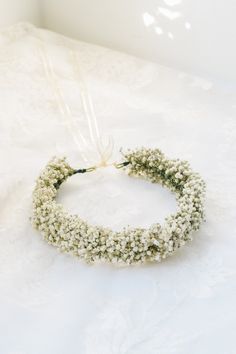 Our Baby's Breath flower crown is a beautiful dried flower crown that compliments well with classic, vintage, rustic, farm, boho, garden, and forest inspired themes and would be absolutely beautiful for any kind of wedding! Nothing beats classic baby's breath.  * Made with real dried baby's breath. Tied with ivory satin ribbon.  * This flower crown will last for years, so you can keep your precious memories from your special day or gift them to your loved ones.  * We make one standard size crown Real Flower Crown, Bridal Flower Crown Boho, Roses Crown, Bud Vases Arrangements, Flower Crown Flower Girl, Baby Breath Flower Crown, Flower Toss, Dried Flower Crown