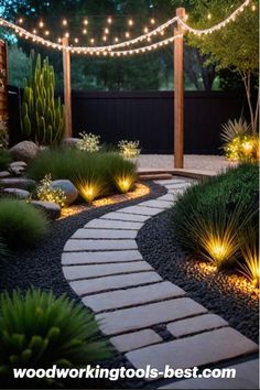 an outdoor walkway with lights strung over it