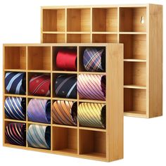 two wooden shelves filled with different types of ties