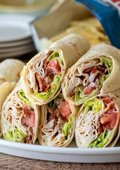 chicken bacon ranch wraps on a white plate