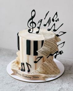 a birthday cake with musical notes on it