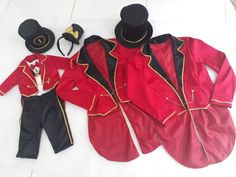 the costume is red and black with gold details