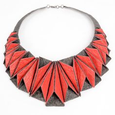 Mixed-Media Necklace - This beautiful, dimensional necklace lays like a collar, standing out for both its structure and shine. Inspired by origami, each piece manipulated by hand and attached to the necklace, not each other, so the necklace can be molded to the wearers neck. Made from hand painted faux leather made from recycled coconut husks, eco friendly, waterproof and an absolute conversation piece! Handmade Geometric Jewelry For Party, Unique Handmade Geometric Necklace, Mixed Media Necklace, Pebble Jewelry, Coconut Husk, Fiber Art Jewelry, Chunky Necklaces, Statement Collar Necklace, Geometric Inspiration