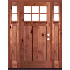 a wooden door with two sidelights and windows