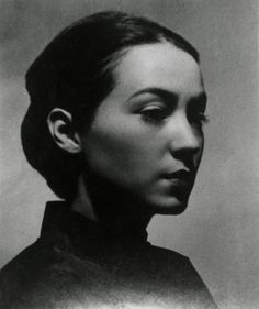 a black and white photo of a woman's face