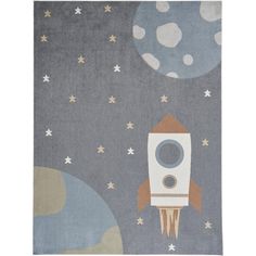 an area rug with a rocket and stars on it