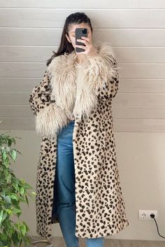 Stay warm and stylish in winter in this Leopard Print Faux Fur Coat. Super soft and thick faux fur and fluffy collar and cuffs make this coat cozy and warm. Fluffy Beige Fur Coat For Fall, Beige Long Sleeve Fluffy Fur Coat, Fluffy Beige Faux Fur Coat, Fluffy Beige Fur Coat For Winter, Winter Beige Fluffy Fur Coat, Cream Fur Coat With Faux Fur Lining, Winter Beige Faux Fur Coat, Beige Faux Fur Coat For Winter, Beige Faux Fur Coat For Fall