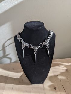 Handmade bzyantine chainmail necklace with spike charms made with aluminum jump rings Width- 1/2 inch Jump Ring Necklace, Chainmail Dreamcatcher, Chainmail Jewelry Patterns, Chain Mail Jewelry, Chainmail Byzantine, Diy Chainmail, Chainmaille Jewelry Patterns, Chainmail Patterns, Chainmaille Necklace