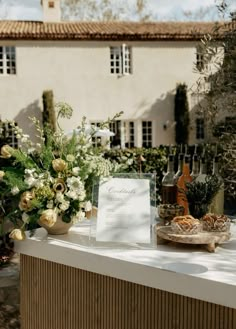 a table with flowers and bottles on it