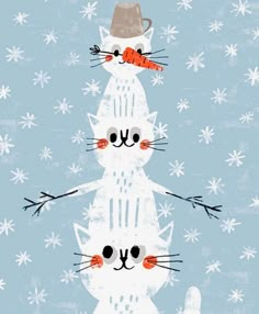 three white cats with carrots on their heads are standing in the middle of snowflakes