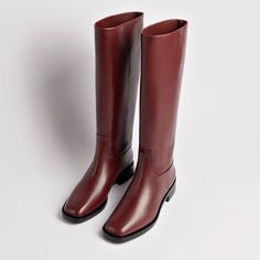 When it comes to the classic riding boot, we love an authentic look and feel, and the Anne is the real deal. Named for Princess Anne and the flat equestrian-inspired boots she made famous, these have new modern details with the same perennial appeal. Product Details: Burgundy Lancaster leather Closed pointed toe Pull up boot 1 inch block heel Finely crafted leather sole for support, durability, and comfort Insole with memory foam cushion and hot stamp logo Peel off the protector before using you Flat High Boots, Hot Stamp, Burgundy Boots, Kitten Heel Boots, Stamp Logo, Platform Flats, High Fashion Outfits, Black Knee High Boots, Sandal Platform