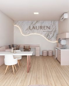 this is an image of a modern kitchen with marble and wood accents on the walls