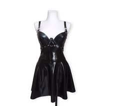 Original black latex dress with adjustable straps. Padded cups beautifully emphasize the bust. Decorative elements in the shape of metal hoops on the front. The dress is flared from the waist with a zipper at the back. This item is made to order. After placing the order, please provide the dimensions in the comments: bust, underbust, cup size, waist, hips. If you have any questions, please contact us. - Made in Poland - Latex made in Poland - Handmade product. LATEX CARE: - Be careful with sharp Black Latex Dress, Decorative Elements, Be Careful, Cup Size, Dress Clothes For Women, Adjustable Straps, The Dress, Custom Made, Dress Outfits