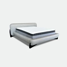 two mattresses sitting on top of each other