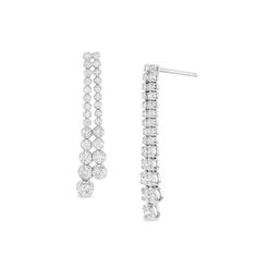 Make a dazzling entrance with these dramatic diamond drop earrings. Crafted in 14K white gold, each earring features two rows of shimmering diamonds - all with a color rank of I and clarity of I1 - that graduate from smaller to larger in a glistening cascade. Captivating with 1 ct. t.w. of diamonds and a brilliant buffed luster, these unforgettable earrings secure comfortably with friction backs. Zales Zales, Expensive Diamond, Diamond Jewelry Designs, Exclusive Jewelry, Diamond Drops, Diamond Drop Earrings, Jewelry Lover, Diamond Stone, Designer Earrings