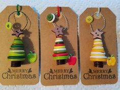 three tags with christmas decorations on them