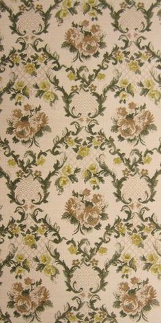 an old wallpaper with flowers and vines on it