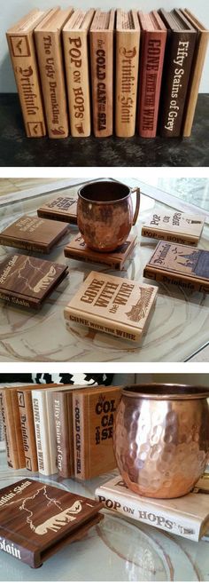 there are many books on the table with copper cups and spoons in front of them