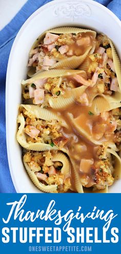 a white bowl filled with pasta covered in sauce