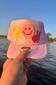 A Wild Bohemian exclusive! One of a kind, trucker hat with patches to match your own unique style! Adjustable snap back closure. Lightweight & breathable mesh back. Made with a durable foam material Pink 5-panel Trucker Hat For Spring, Pink Trucker Hat With Curved Bill For Outdoor, Pink Mesh Hat With Curved Brim, Adjustable Pink Trucker Hat With Patches, Pink Mesh Trucker Baseball Cap, Pink Mesh Baseball Cap, Casual Pink Mesh Baseball Cap, Pink Trucker Snapback Hat For Spring, Pink Cap With Patches