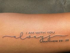 a tattoo with the words i am with you always written in cursive writing