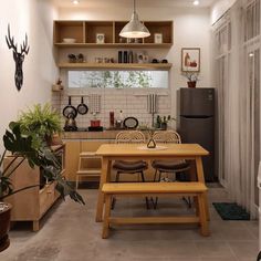 the kitchen is clean and ready to be used as a dining room or living area