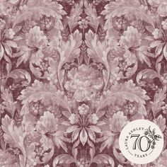 an old fashioned wallpaper with flowers and leaves on it's side, in pink