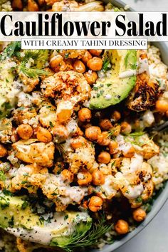 a bowl filled with cauliflower salad and topped with chickpeas, avocado