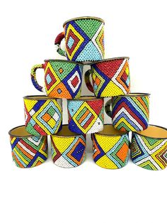 a stack of colorful cups sitting on top of each other