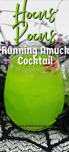 a green drink in a glass sitting on top of a black lace tablecloth with the words hock's pons rumming amuck cocktail