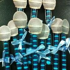 several blue and white microphones with bows on them