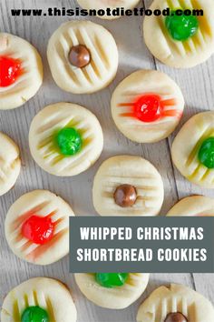 christmas shortbread cookies with candy on top and the words whipped christmas shortbread cookies