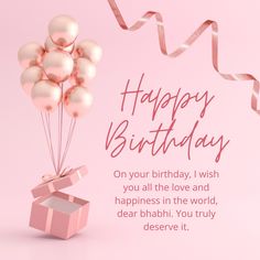 a pink birthday card with balloons and a gift box