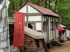 there are many tents set up in the woods