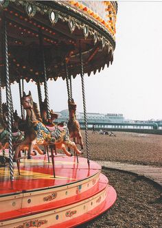 an old fashioned merry go round at the beach