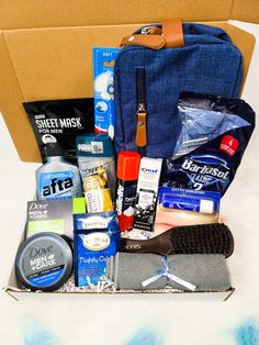 an open box containing men's grooming products