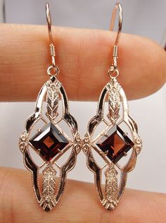 Excited to share the latest addition to my #etsy shop: Victorian Red Garnet Sterling Silver & Rose Gold Victorian Floral Leaf Filigree Earrings (Made To Order) https://etsy.me/2SGhdzo #jewelry #earrings #gold #victorian #earwire #rosegold #yes #girls #garnet Victorian Filigree, Earrings Rose Gold, Filigree Earrings, Garnet Earrings, Antique Earrings, Victorian Jewelry, Lovely Earrings, Rose Earrings