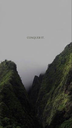 the mountains are covered in green mossy vegetation and there is a quote that reads conquer it