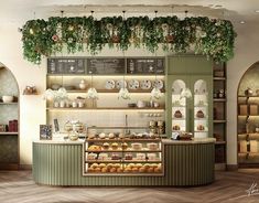 the interior of a pastry shop with lots of pastries and desserts on display