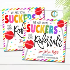 two colorful gift tags with the words, we are total suckers for your refer