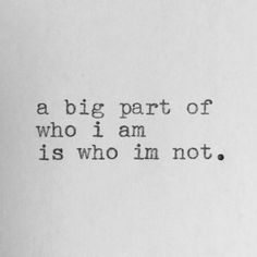 an old typewriter with the words, a big part of who i am is who i'm not