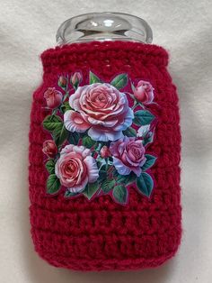 Cranberry candle cozy for a 22oz Yankee Candle jar. I have crocheted the cozy using 100% Cranberry Acrylic yarn. On the front I have added a heat transfer of Pink Roses. There is a thin cord running along the top edge to tie up the cozy tighter. These can be used as a mason jar cover, candle cozy, or candy jar cover. Put a battery tea light inside for a soft glow. Mason jars make great gift ideas for birthdays and parties. Great idea when the candle begins leaving black marks inside the jar, just cover with one of these cozies and you no longer see the black marks. The top is open and safe for burning the candle. The item includes only the crocheted cozy, not the Candle. Glow Mason Jars, Cranberry Candles, Candle Cozy, Crochet Candle, Yankee Candle Jars, Battery Tea Lights, Cozy Cover, Candle Sleeves, Candle Wrap