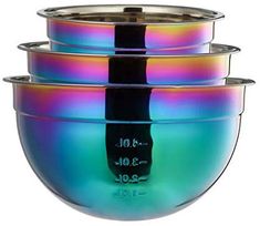 three bowls are stacked on top of each other with the lids down and rainbow colors