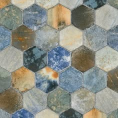 an image of a tile floor that looks like hexagonals with different colors