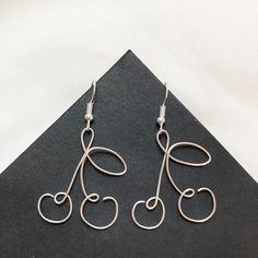 ✦ Perfect earrings for spring and summer (or Harry Styles and Lana Del Rey fans!)  ✦ New & handmade ✦ Handle with delicacy to avoid bending the wire! ✦ Imperfections & plier marks may be visible ✦ Silver/good plated lead & nickel free zinc alloy hooks; 20 gauge wire ✦ Rubber backings included ✦ More jewelry on my shop; message for customs! Shaped Wire Earrings, Thick Wire Jewelry, 26 Gauge Wire Jewelry, Moon Wire Earrings, Butterfly Wire Earrings, Wire Designs Ideas, Christmas Wire Jewelry, Wire Bending Jewelry, Ideas Con Alambre