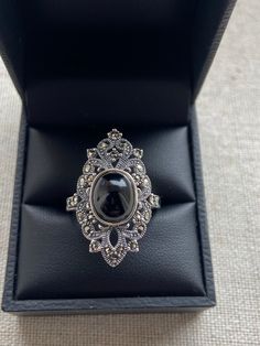 Sterling Silver onyx Marcasite ring Beautiful art deco style  Rhodium finish  Ring face Approx 28 x 18mm Brand new Supplied with ring box Vintage Oval Marcasite Rings, Antique Silver Rings For Formal Occasions, Vintage Marcasite Oval Rings, Formal Antique Silver Hallmarked Ring, Oval Black Enamel Art Deco Rings, Art Deco Black Enamel Oval Ring, Collectible Oval Ring With Black Enamel, Oval Marcasite Jewelry For Formal Occasions, Formal Oval Marcasite Jewelry